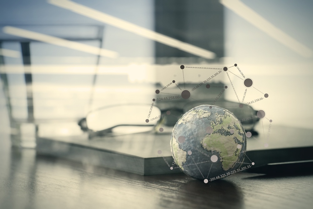 double exposure of hand drawn texture globe with social media diagram on wood table near note book and glasses